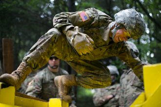 Cadet moves through the obstacle at FRLC.